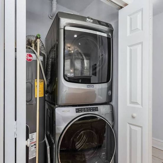 Laundry facility view of Casa Historia: Sleek 2b Apt Unique Spot Downtown