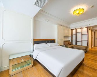 Rezen Reheal Hotel (Zhonggulou Wulukou Subyway Station) - Xian - Quarto