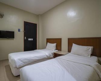 OYO 90576 Holiday Dive Inn - Semporna - Habitación