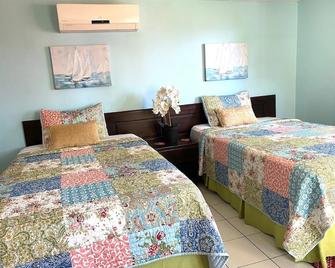 Mystic Ridge Resort Apt 57 - אוקו ריוס - חדר שינה