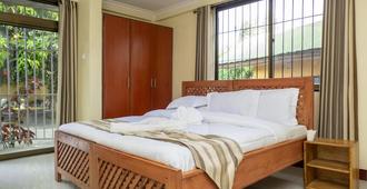 Runako Lodge - Arusha - Bedroom