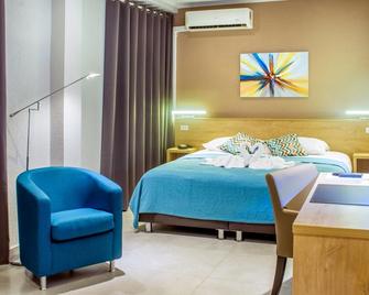Q-Inn Boutique Hotel - Paramaribo - Schlafzimmer