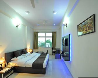 Hotel Shivam - Ajmer - Slaapkamer