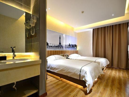 Henghe Chuntian Holiday Hotel - Harbin - Bedroom