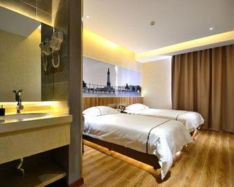 Henghe Chuntian Holiday Hotel - Harbin - Kamar Tidur