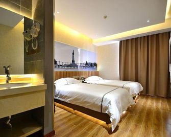 Henghe Chuntian Holiday Hotel - Harbin - Bedroom