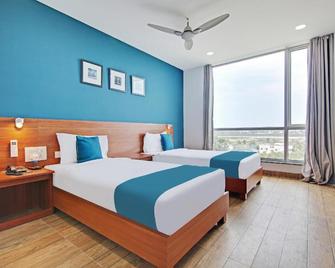 OYO 20018 Silverkey D Square Omr - Navalur - Bedroom