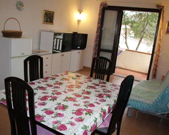 Residence Itaca - Porto Pozzo - Dining room