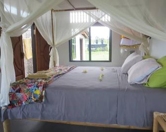 Banana Garden Bungalow - discover village culture in real Bali - Kerambitan - Habitación