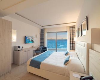 Ramla Bay Resort - Mellea - Camera da letto