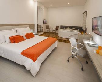 Hotel Dix - Medellín - Yatak Odası