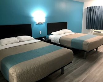 Motel 6 Metropolis. Il - Metropolis - Schlafzimmer