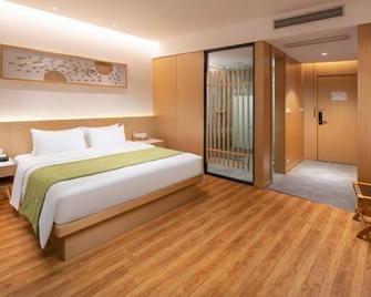 Bindun Langyi Hotel - צ'ונגקינג - חדר שינה