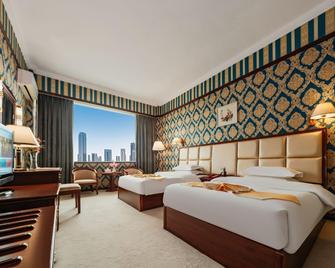 Longma Hotel - Honghe - Bedroom