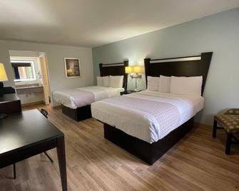 ترايكوف إن آند سويتس - جاكسونفيل (فلوريدا) - غرفة نوم