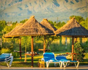 Howard Johnson Hotel & Convention Center by Wyndham, Merlo - וילה דה מרלו - פטיו