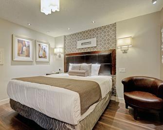 Helm's Inn - ויקטוריה - חדר שינה