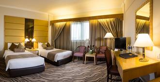 Hotel Miramar Singapore - Singapur - Schlafzimmer