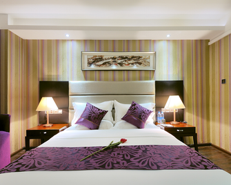 Tulips International Hotel - Beihai - Bedroom