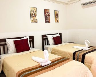 Rueangrat Hotel - Ranong - Schlafzimmer