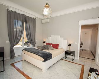 Compasso Suites - Viterbe - Chambre