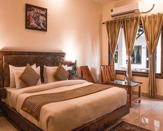 Vow Resorts And Spa, The Corbett Wilderness - Rāmnagar - Schlafzimmer