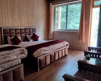 Hotel Shwetambara - Gangotri - Bedroom