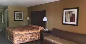 Executive Inn & Suites - Longview - Bedroom