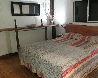 Hostal La Minga - Chaitén - Habitación