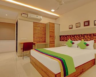Treebo Rainbow Grand - Вишакхапатнам - Спальня