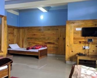 Hotel Mon Kyimojong - Tawang - Bedroom