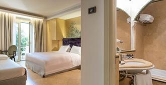 Romano Palace Luxury Hotel - Catania - Schlafzimmer