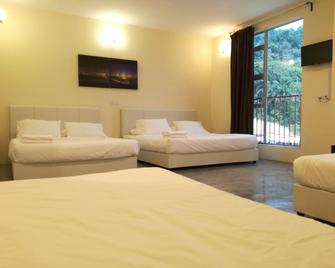 Hotel Pangkor Mutiara - Пангкор - Спальня