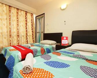 Veenai Hotel - Butterworth - Schlafzimmer