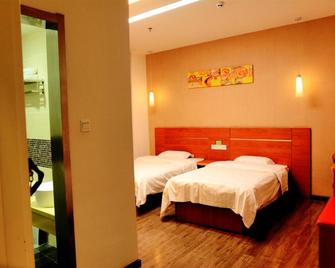 7Days Inn Hulu Island Xingcheng University Town Branch - Huludao - Bedroom