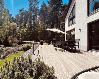 Fantastic lake view, motor boat, close to the beach, WiFi, fireplace, 2 baths, relaxation - Wittstock/Dosse - Patio