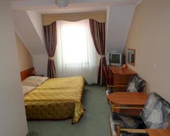 Hotelik Zelwagi - Mikolajki - Schlafzimmer