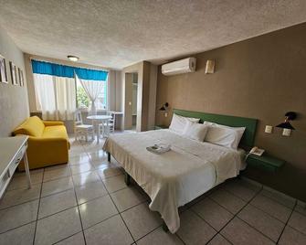 Hotel Punto Poza Rica - Poza Rica - Habitación