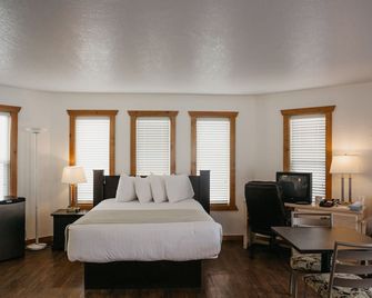 Golden Village Lodge - גולדן - חדר שינה