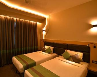 The Cent Hotel - Hyderabad - Schlafzimmer