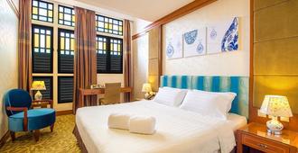 โรงแรมซานต้า แกรนด์ อีสต์โคสต์ - สิงคโปร์ - ห้องนอน