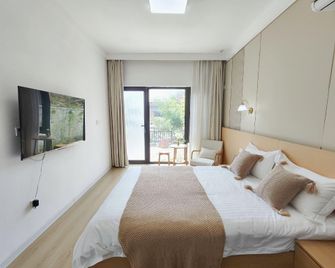 Luoyang Yunsheng Bamboo House Homestay (Lijing Branch, Cross Street, Luoyi Ancient City) - Luoyang - Chambre