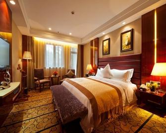 Yangzhou Hentique Huijin Resort Hotel - Yangzhou - Schlafzimmer