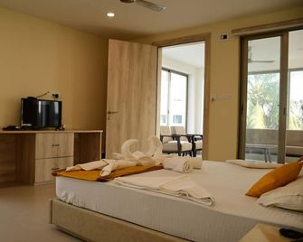 Dolphin Hotel Digha - Digha - Schlafzimmer