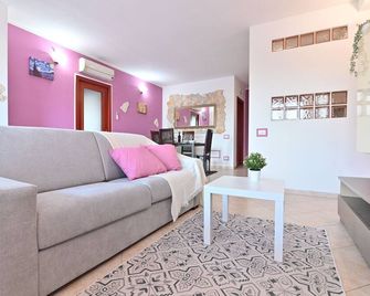 Izzhome Njoy - Pula - Sala de estar