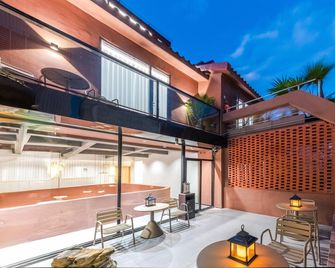 Quanzhou Taoyeji M0 Homestay (West Street) - Quanzhou - Edificio