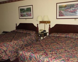 Hari Holiday Motel - Prairie du Chien - Bedroom