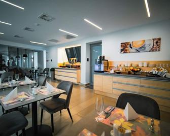 Eleven Business & Sport Hotel - Jászárokszállás - Restaurante