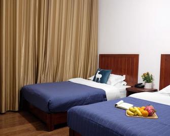Zhangjiajie Mountain Hostel - Zhangjiajie - Schlafzimmer