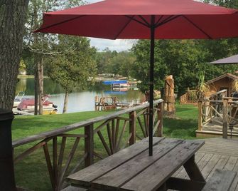 Lake Front One Bedroom Log Cabin located at Clear Lake Resort and Boat Rental - West Branch - Patio